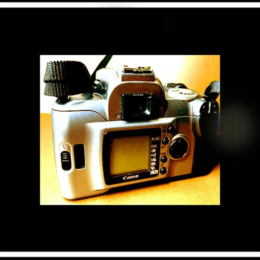 Canon Rebel EOS T2 Photography Camera With An Original Canon Camera Strap